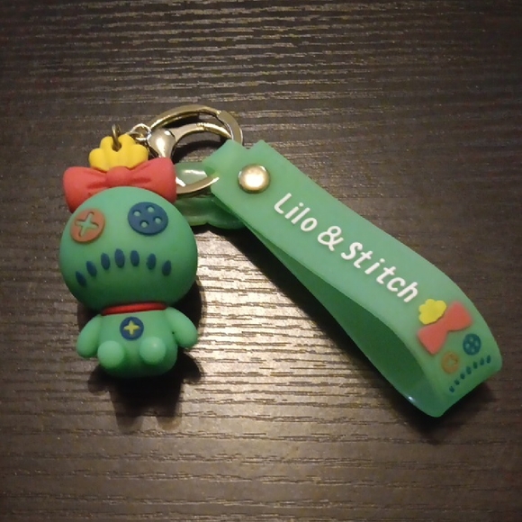 Accessories - Lilo & Stitch Green Keychain with Red Bow